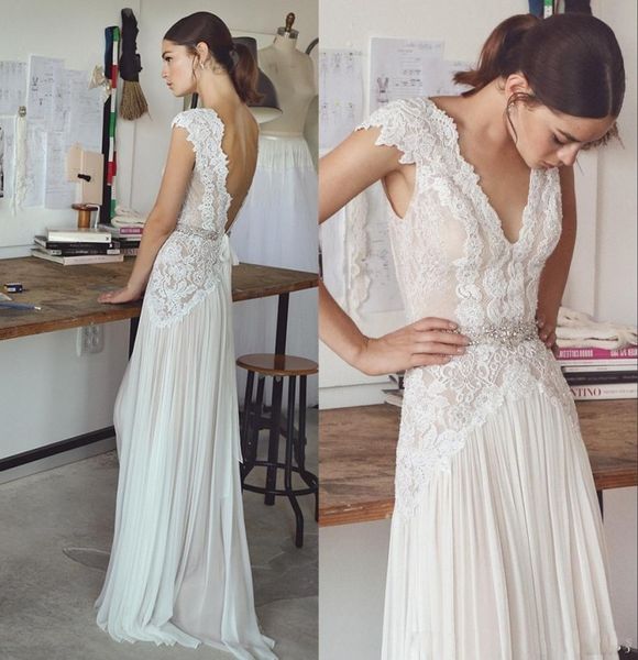 

boho wedding dresses lace applique bohemian bridal gowns with cap sleeves and v neck pleated skirt elegant a-line beach vestido de novia, White
