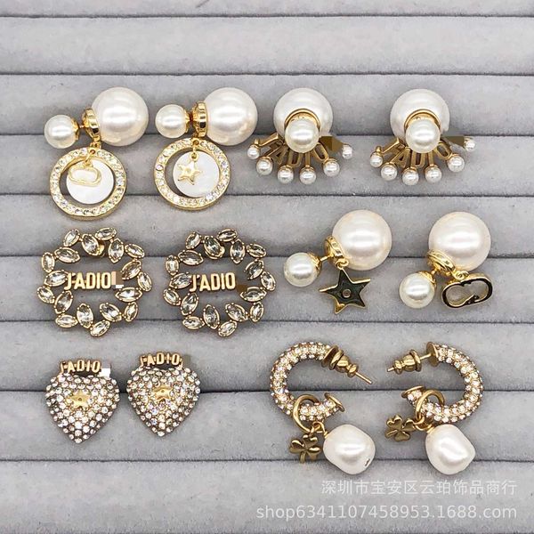 

d family / dijia new pearl cd letter horse eye love diamond earrings, Golden