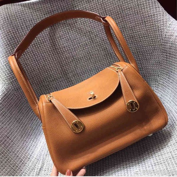 

2021 new layer doctor s bag litchi pattern lindi women one houlder hand medicine cae cow leather pillow luxury designer