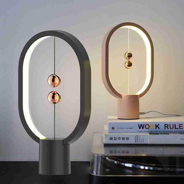 

dc5v 5w 48led mini heng balance led table lamp ellipse magnetic mid-air switch usb powered warm white night light