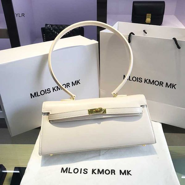 

hong kong 2020 new niche western style women's bag genuine leather solid gold button single shoulder underarm kelly