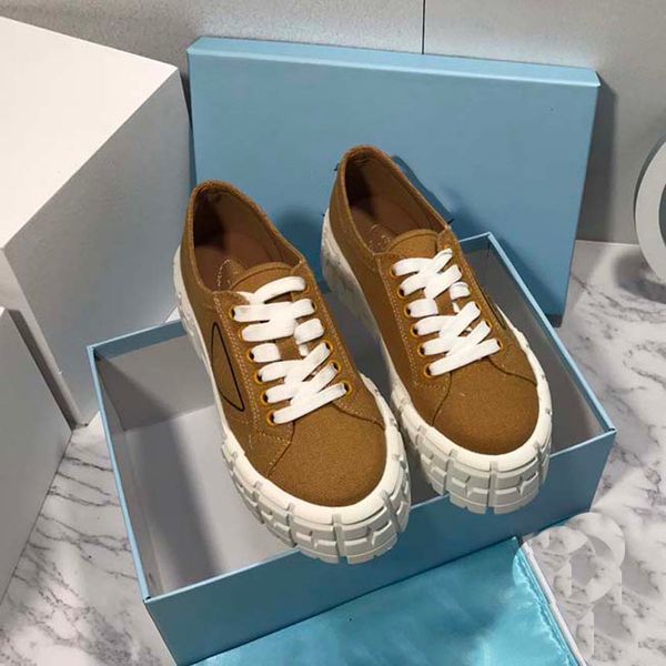

designer shoes rubber platform inspired by motocross tires defines the unusual design of these nylon gabardine sneakers, Black