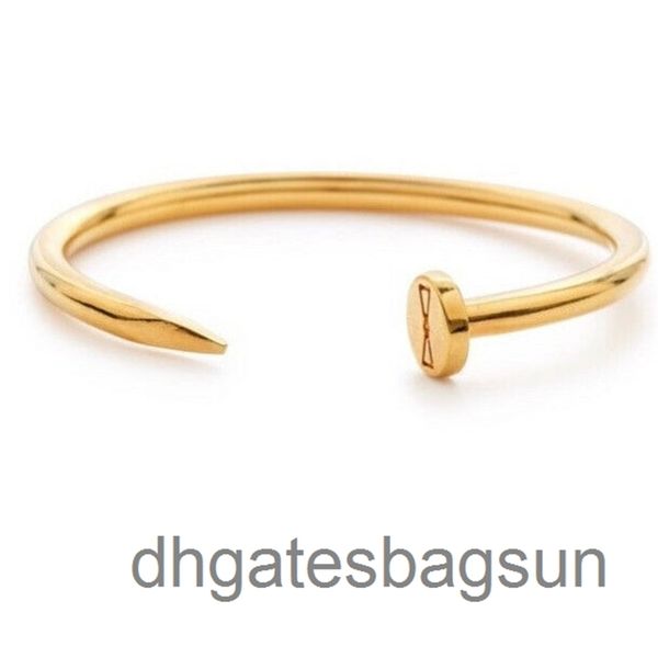 

stella and bow premium quality gold toned bangle nail bracelet, Black