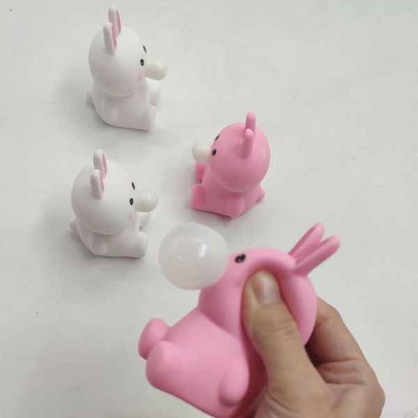 Brinquedo de aperto de festa de Páscoa para crianças rosa branco coelho crianças liberar estresse espremer o coelho para cuspitar bolhas brinquedos
