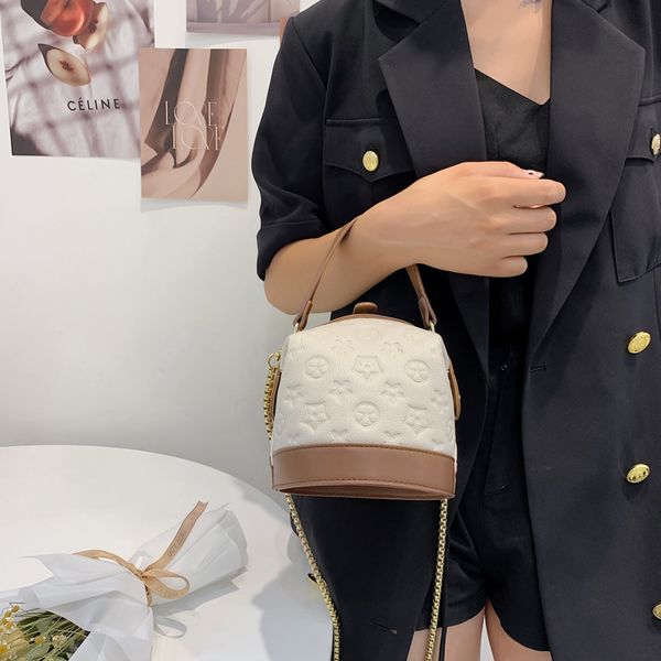 

luxury handbags chao cylinder hand new 2021 net red korean old flower wrist small satchel single shoulder messenger women's bag