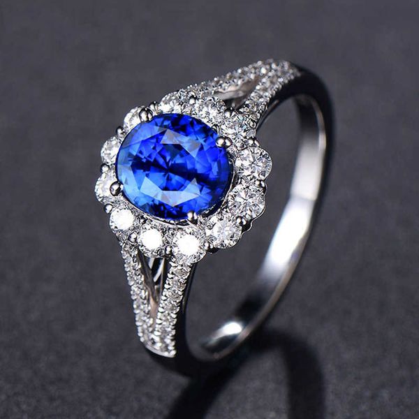 

temperament high-end flower egg shaped oval blue ring female inlaid zircon live ring hand jewelry, Golden;silver