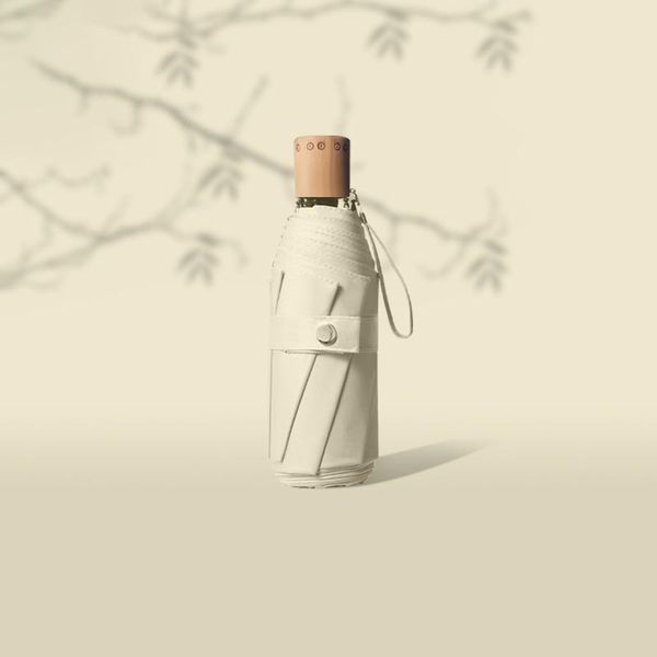 

umbrellas uv resistance japanese little mini umbrella girl cute small folding vogue portable summer paraplu home hx50um