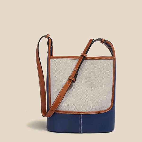 

korean minority contrast canvas bucket bag women's autumn high capacity 2021 new single shoulder bag messenger