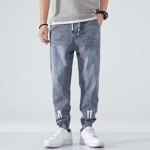 

spring and autumn thin jeans light blue men's loose legged elastic waist pantswinter