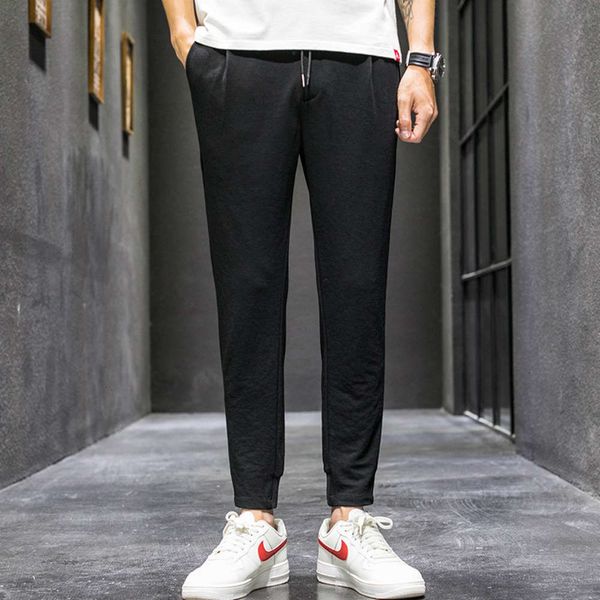 

km 2020 summer new fashion trend solid color versatile casual pants men's black legged capris