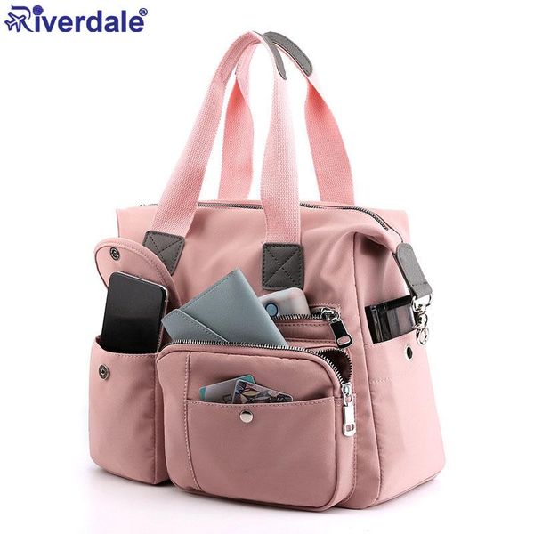 

2021 new waterproof nylon travel bag for women bag solid color travel handbag lady big shoulder female duffels