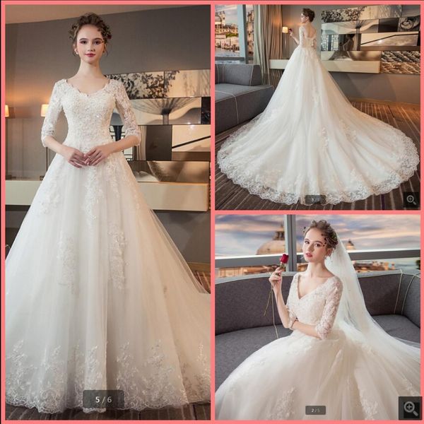 

robe de mariage 2021 modest ball gown wedding dress beaded lace appliques half sleeve v neck vintage bridal gowns princess corset saudi arab, White