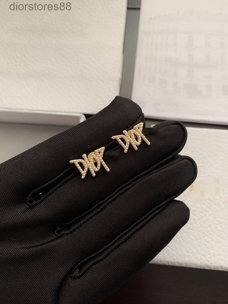 

ring d family millet pearl letter earring 925 silver needle