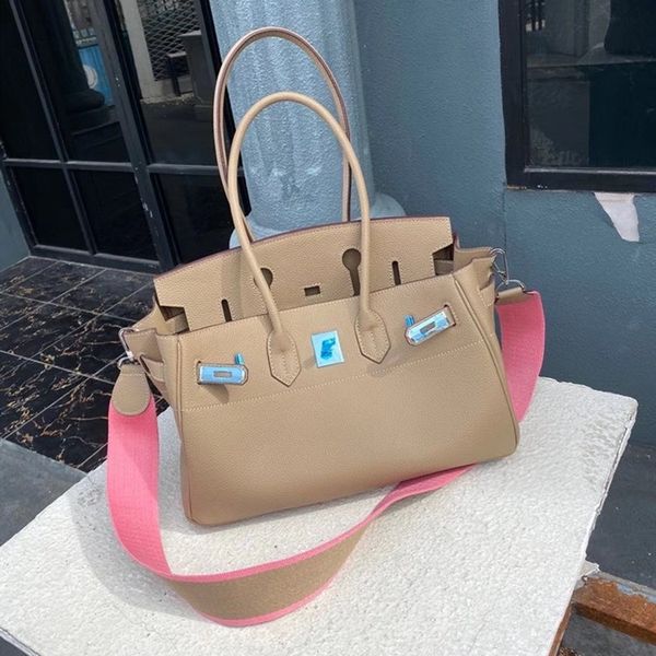 

leather women s bag horizontal togo leather with wide shoulder strap, portable single shoulder bag, silver buckle, fashion bag
