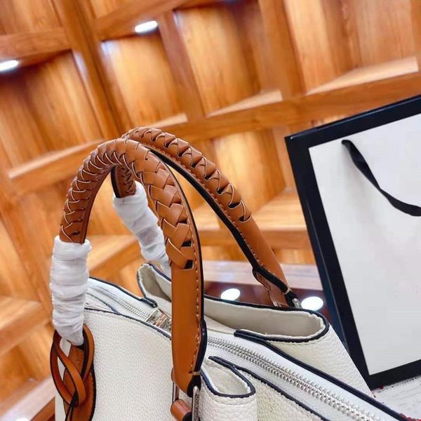 

high pattern. woven lettered shoulder women's handbag, flower handle, two leather tassel, side purse, bag quality xvmha