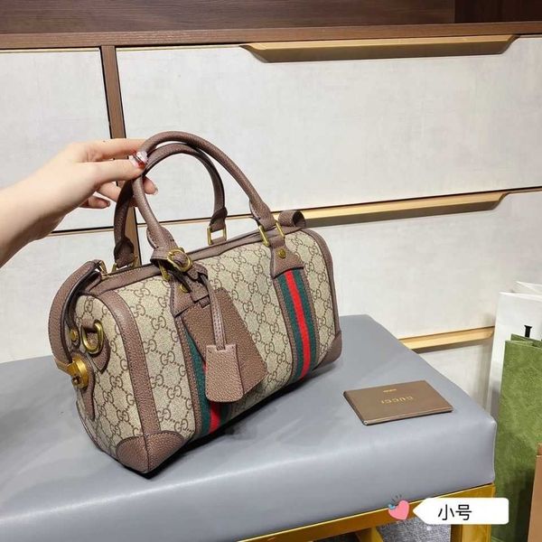 

wholesale genuine boston counter coolgio exclusive cylinder one shoulder slant cross hand pillow women's bag luxurys designers bag yw