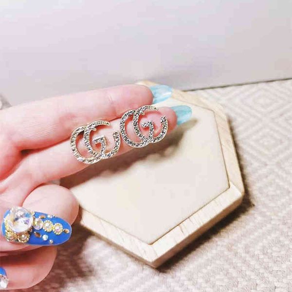 

factory specials s925 silver needle new letter zircon personalized versatile shiny fashion trend and south earrings