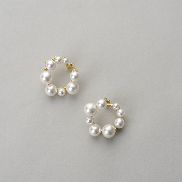

design jewelry celi's misplaced front back clip are elegantly matched with korean style pearl earrings and earrings, Golden