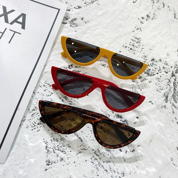 

2021 european and american modern style personalized small frame retro cat eye sunglasses womens fashionable semi-rimless sunglasses cross-s, White;black
