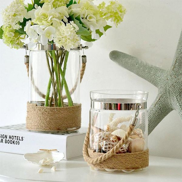 

french country / mediterranean / pastoral flowers into a vase glass candlestick