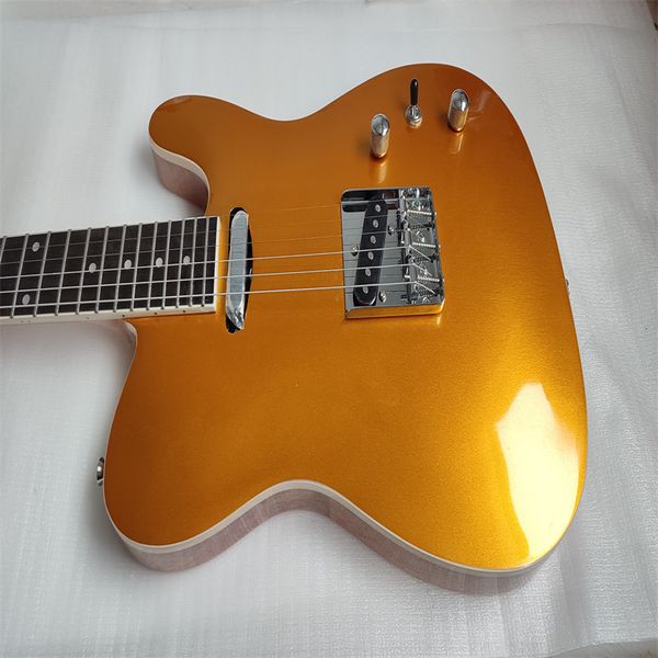 

golden metallic color electric six strings guitar