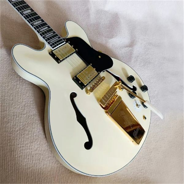 

classic brand electric guitar, hollow jazz big rocker vibrato system, full timbre, delivery to home. guitars guitarra