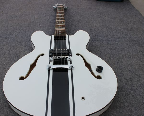 

rare es 333 tom delonge semi hollow body white jazz electric guitar single pickup, silver hardware, double f holes, dot inlay, grover tuners