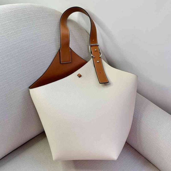 

2020 new leather color contrast large capacity wide shoulder strap bucket bag armpit simple women's one hand