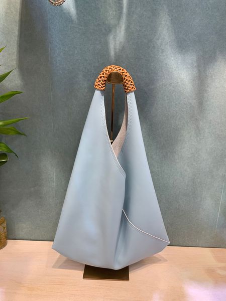 

new soft glutinous cowhide minimalist ethnic style woven wrist shoulder portable tote bag