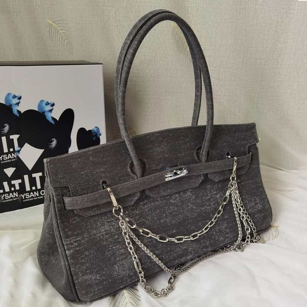 

women's new single shoulder design net red same hand canvas underarm bag