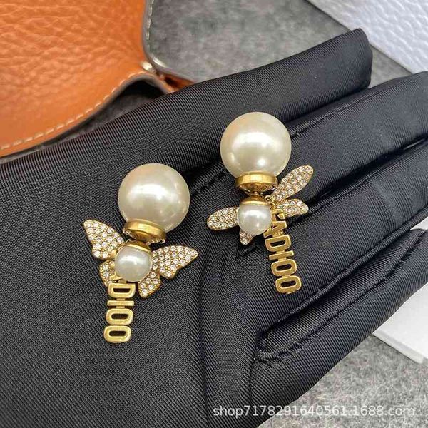 

buy 75% off butterfly asymmetric earrings women's short personalized red with versatile fashion, Golden;silver