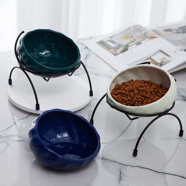 

ceramic cat bowl with iron frame to protect cervical spine