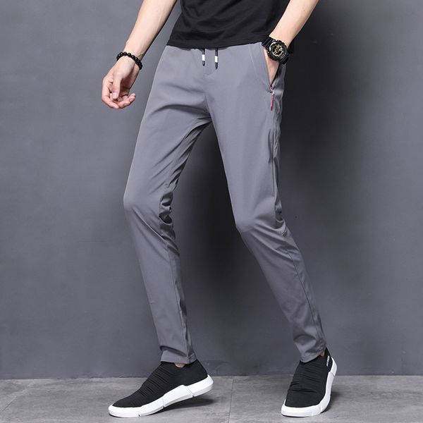 

selling product in 2021 summer new ice side casual broek men stretch slim korean small foot sport men's wear, Black