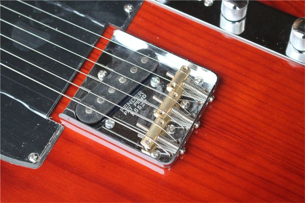 

6 strings metallic red electric guitar with maple fretboard