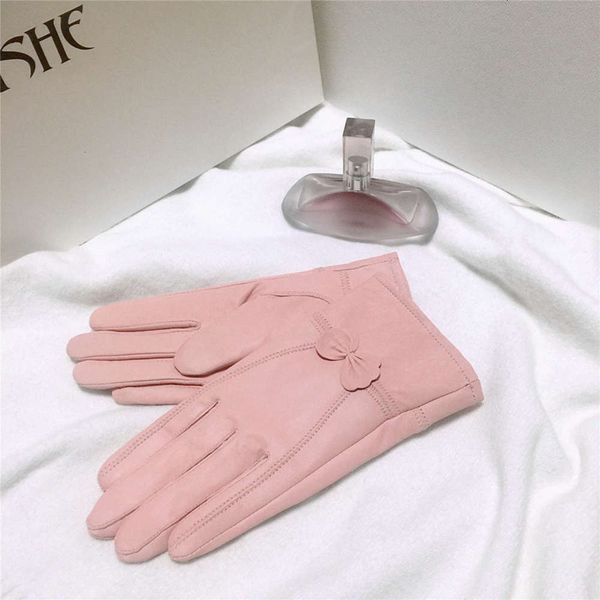 

women and cold haining warm leather proof gloves bow lovely driving autumn and winter plush sheepskin gloves lady, Blue;gray