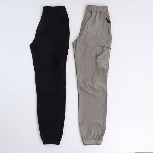 

konng gonng Spring and summer Men's Pants fashion brand retro Multi Pocket overalls jogging Leggings Tie one's feet, Green