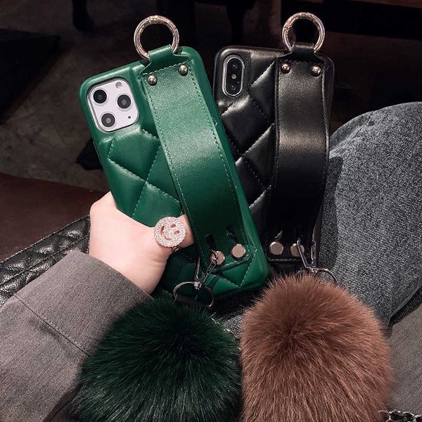 

fashion wrist band lambskin leather case cover with fox fur ball pendant hand strap for iphone 11 pro xs max xr x 8 7 6 6s plus se 2020