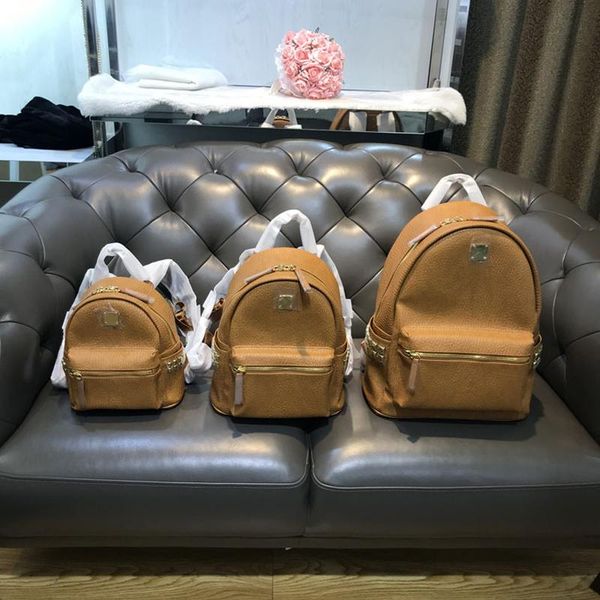 

backpack classic fashion student style schoolbag leather rivet travel bag