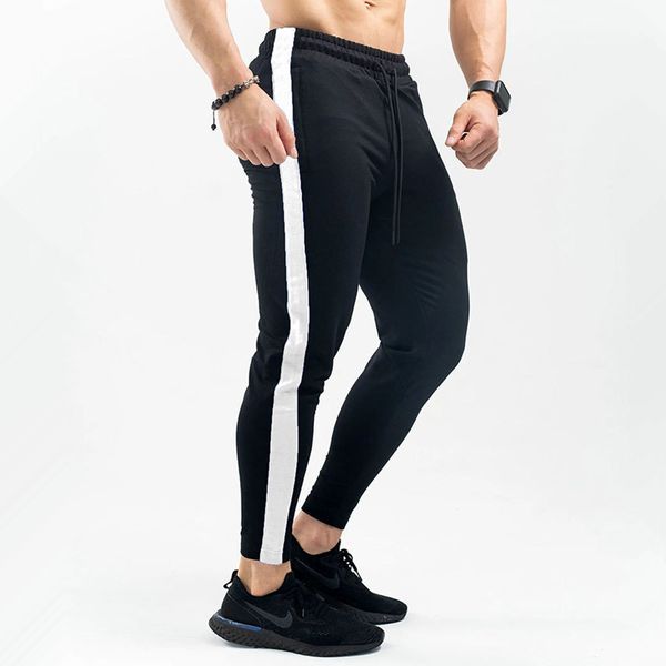 Pantaloni da jogging Pantaloni sportivi da uomo Pantaloni skinny casual Palestra Fitness Allenamento Abbigliamento sportivo Pantaloni da uomo Autunno Pantaloni sportivi da corsa in cotone