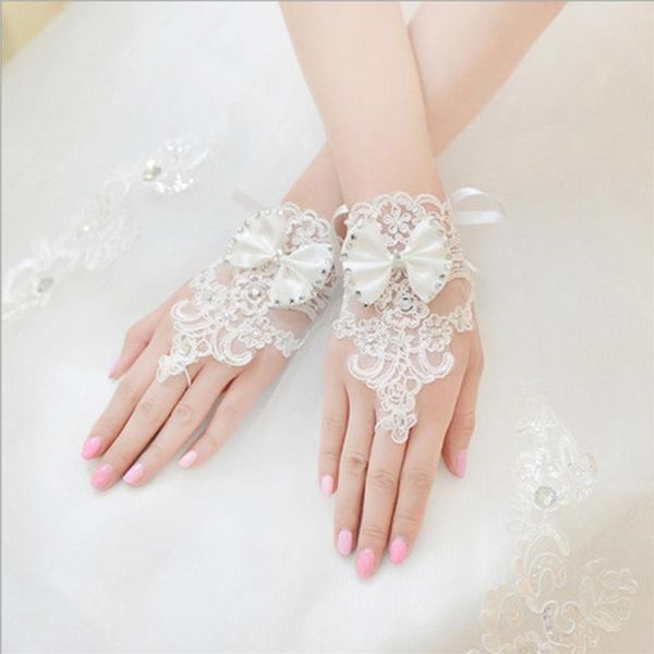 

bridal gloves short wrist length lace wedding glove with bow trim, White