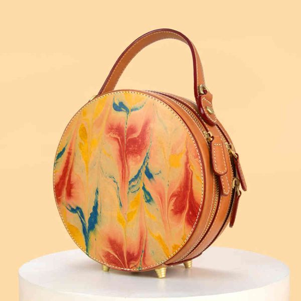 

2021 new autumn and winter leather messenger bag women's ins versatile portable round high-grade handmade bag