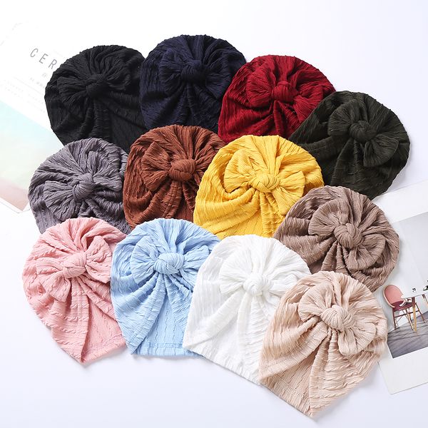 12 adet / grup Katı Pamuk Örme Bebek Şapka Sevimli Yay Topnot Erkek Kız Kış Kap Yüksek Elastik Yenidoğan Türban Headwrap Kalın Beanies