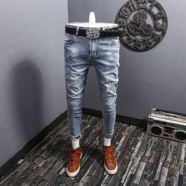 

light color jeans with holes in spring and summer, Blue