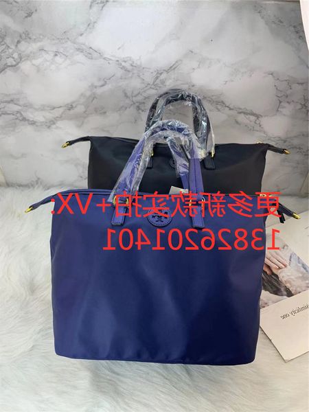 

new tb nylon portable one shoulder straddle bag for women in 2021