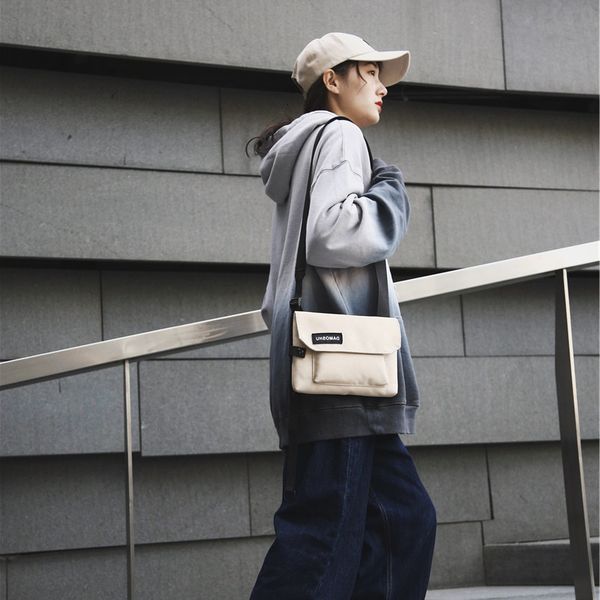 

single shoulder bag women's korean version new solid color small men's and messenger versatile square portable fashion