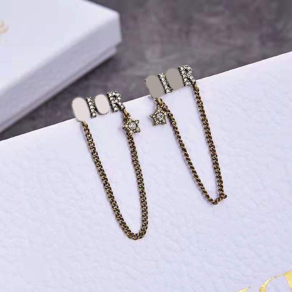 

di's long tassel cd letter earrings female d's wind ins net red same, Golden