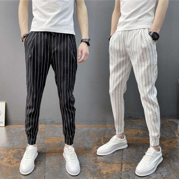 

summer new men's vertical striped small leg casual net red matching hemmed in slim capris stretch harem pants, Black