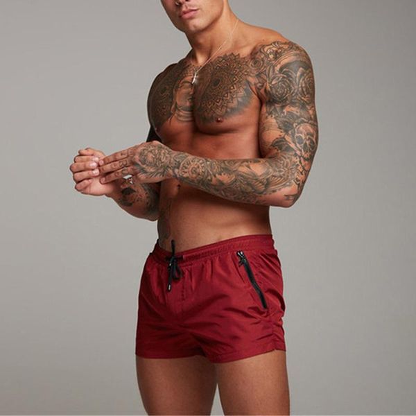 

men's shorts summer solid color lace up zipper pocket casual mid waist elastic four colors available, White;black