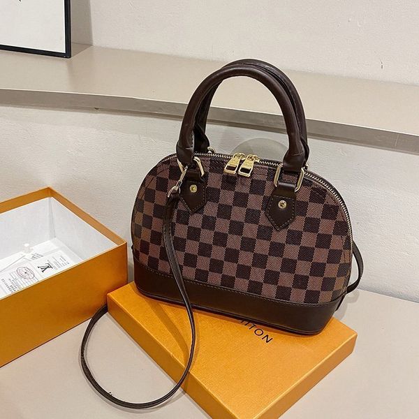 

factory direct sale 75% off 2021 autumn and winter female luxury hand-held flower shell large capacity single shoulder oblique span bags