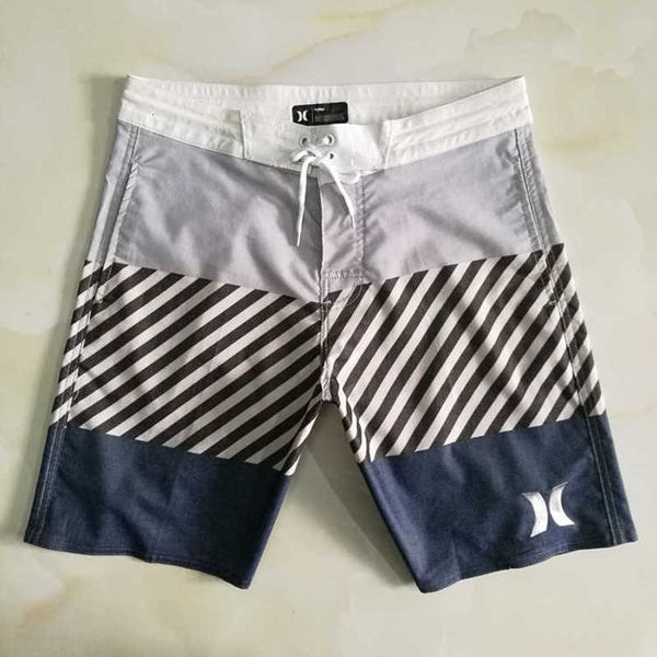 

men's trunks sell fast beach loose size comfortable good recommend surfing swimming shorts, White;black